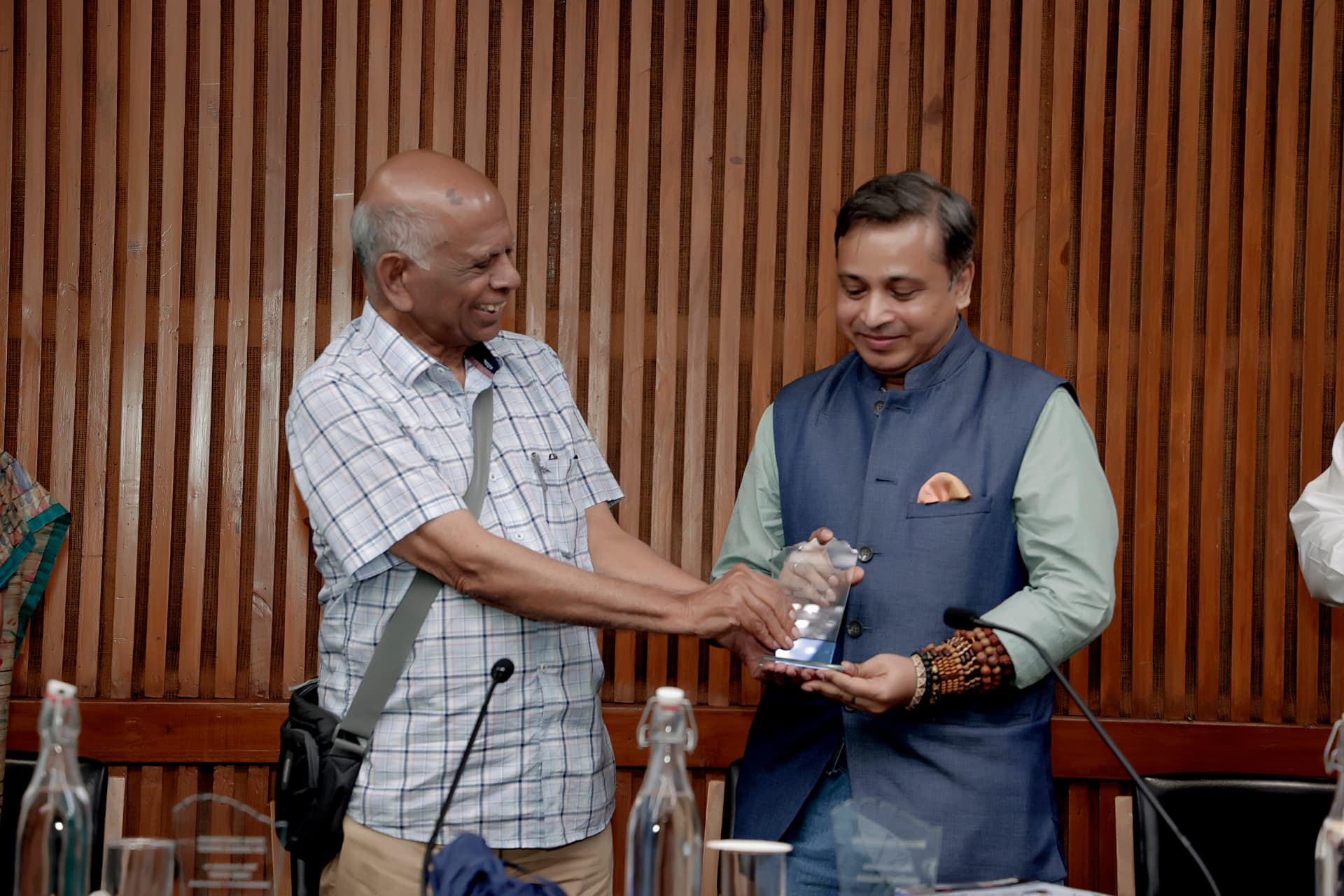 Dr. Siddharth Sen receiving an honour from Ambassador K.P. Fabian